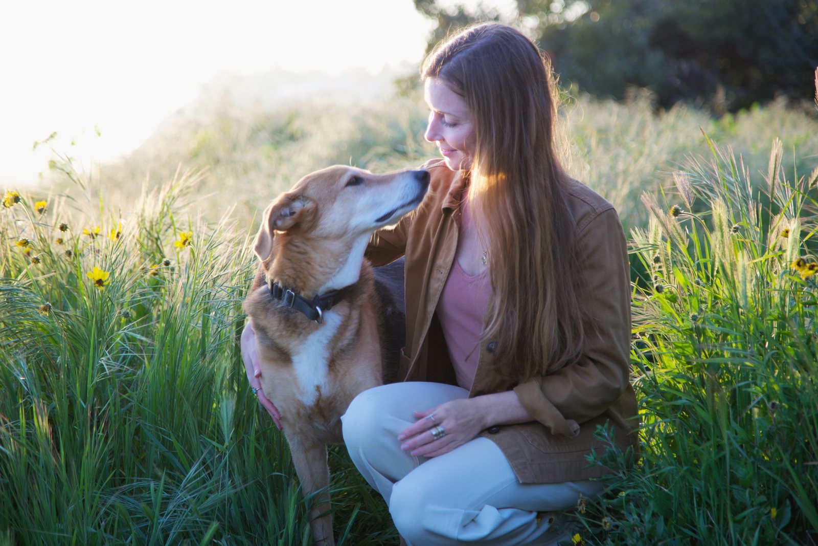 Hattie with her person at golden hour
